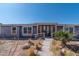 House exterior with a covered entryway and walkway at 3718 S 379Th Ave, Tonopah, AZ 85354