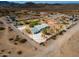 Aerial view of a single-story home with a large yard and desert landscape at 3718 S 379Th Ave, Tonopah, AZ 85354