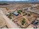 Aerial view of a ranch-style home with surrounding desert landscape at 3718 S 379Th Ave, Tonopah, AZ 85354
