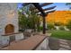Outdoor kitchen with grill, sink, and ample counter space at 5201 N Saddle Rock Dr, Phoenix, AZ 85018