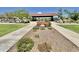 Entrance to Canyon Park, featuring a shaded seating area, playground, and signage at 18147 W Ida Ln, Surprise, AZ 85387
