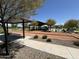 Community bocce ball court with covered seating areas at 18147 W Ida Ln, Surprise, AZ 85387