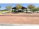 Community playground with covered picnic area nearby at 18147 W Ida Ln, Surprise, AZ 85387