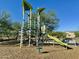 Play area with climbing frames and slide at 18147 W Ida Ln, Surprise, AZ 85387