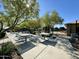 Picnic tables and seating area near the community pool at 18147 W Ida Ln, Surprise, AZ 85387
