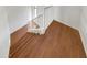 Stylish interior staircase with wood flooring and white railings at 2970 N Oregon St # 10, Chandler, AZ 85225