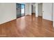 Bedroom with wood-look floors and private access to deck at 2970 N Oregon St # 10, Chandler, AZ 85225