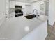 Modern kitchen featuring white cabinets and stainless steel appliances at 2970 N Oregon St # 10, Chandler, AZ 85225
