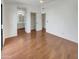 Bedroom with wood-look flooring and access to patio at 2970 N Oregon St # 10, Chandler, AZ 85225