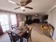 Open living and dining area with foosball table at 206 N 5Th St, Avondale, AZ 85323
