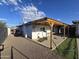 Covered patio and grassy area in the backyard at 206 N 5Th St, Avondale, AZ 85323