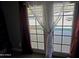View of backyard through sliding glass doors at 206 N 5Th St, Avondale, AZ 85323