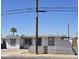Charming single story home with modern gray fence at 206 N 5Th St, Avondale, AZ 85323