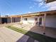 Covered patio with seating area and artificial turf at 206 N 5Th St, Avondale, AZ 85323