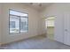 Comfortable bedroom with mirrored closet doors and window at 2223 E Branham Ln, Phoenix, AZ 85042