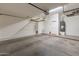 Garage with overhead storage and extra space at 2223 E Branham Ln, Phoenix, AZ 85042