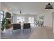Virtually staged living room with fireplace and seating area at 2223 E Branham Ln, Phoenix, AZ 85042