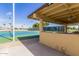 Covered seating area overlooking tennis courts at 9327 E Sun Lakes Blvd, Sun Lakes, AZ 85248