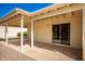 Covered patio with sliding glass door access at 9327 E Sun Lakes Blvd, Sun Lakes, AZ 85248