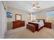 Spacious Primary bedroom with large dresser and comfortable bed at 17518 W Desert Sage Dr, Goodyear, AZ 85338