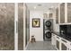 Laundry room with modern appliances and stylish cabinetry at 6413 N 31St St, Phoenix, AZ 85016