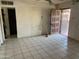 Living room with tiled floor and door at 1202 S 14Th St, Phoenix, AZ 85034