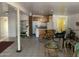 Living room with kitchen and barstools at 1202 S 14Th St, Phoenix, AZ 85034