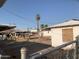 Backyard with damaged structures and sparse landscaping at 1202 S 14Th St, Phoenix, AZ 85034