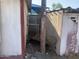 Side yard with damaged shed and debris on the ground at 1202 S 14Th St, Phoenix, AZ 85034