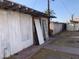 Exterior view of a building with damaged walls and doors at 1202 S 14Th St, Phoenix, AZ 85034