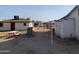 Backyard with picnic table and multiple buildings at 1202 S 14Th St, Phoenix, AZ 85034
