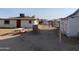 Backyard area with picnic table and several small structures at 1202 S 14Th St, Phoenix, AZ 85034