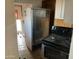 Small kitchen with stove and refrigerator at 1202 S 14Th St, Phoenix, AZ 85034