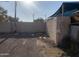 View of a side yard with a wall and some debris at 1202 S 14Th St, Phoenix, AZ 85034