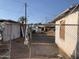 Backyard area showcasing the back of the house and neighboring units at 1202 S 14Th St, Phoenix, AZ 85034