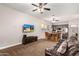 Open concept living room with kitchen and dining views at 8752 E Plata Ave, Mesa, AZ 85212