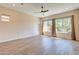 Bright living room with tile floors and large windows at 31207 N 124Th Dr, Peoria, AZ 85383