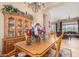 Charming dining room with a wooden table and matching hutch at 40010 N Candlewyck Ln, Phoenix, AZ 85086