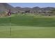 Green golf course with mountain backdrop at 40010 N Candlewyck Ln, Phoenix, AZ 85086