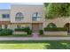 Two-story tan building with arched windows at 225 N Standage -- # 102, Mesa, AZ 85201