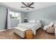 Spacious bedroom with ceiling fan and ample closet space at 4628 E Holly St, Phoenix, AZ 85008