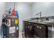 Laundry room with washer, dryer and water heater at 4628 E Holly St, Phoenix, AZ 85008