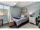 Small bedroom with a double bed, nightstand and window at 4628 E Holly St, Phoenix, AZ 85008