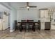 Dining area with a table and four chairs adjacent to kitchen at 4628 E Holly St, Phoenix, AZ 85008