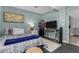 Bedroom with double bed, dresser, and a world map on the wall at 4628 E Holly St, Phoenix, AZ 85008