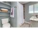 Bathroom with bathtub, shower, and a granite countertop at 4628 E Holly St, Phoenix, AZ 85008