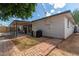 Back exterior view showing patio, landscaping, and grilling area at 4628 E Holly St, Phoenix, AZ 85008