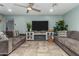 Spacious living room features a fireplace and comfortable seating at 4628 E Holly St, Phoenix, AZ 85008