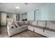 Spacious living room with comfortable sectional sofa at 4628 E Holly St, Phoenix, AZ 85008