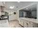 Modern kitchen with white cabinets and quartz countertops at 4628 E Holly St, Phoenix, AZ 85008
